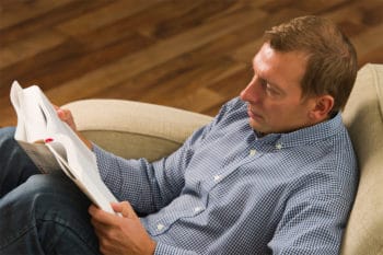 man reading a newspaper